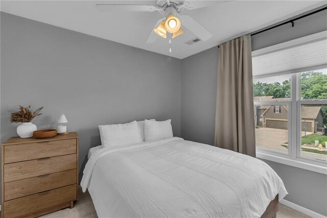 1610 Renea Ct, Kearney, MO 64060 - bedroom featuring carpet floors, ceiling fan, and baseboards