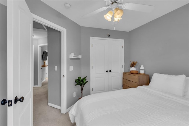 1610 Renea Ct, Kearney, MO 64060 - carpeted bedroom featuring baseboards, a closet, and a ceiling fan