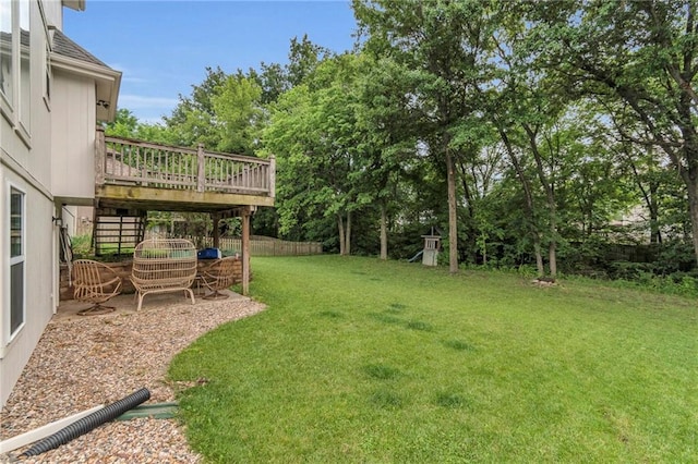 1610 Renea Ct, Kearney, MO 64060 - view of yard featuring a wooden deck, a patio area, a playground, and view of scattered trees