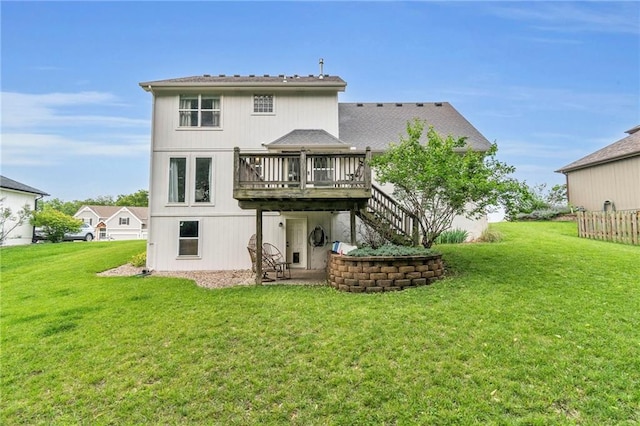 1610 Renea Ct, Kearney, MO 64060 - back of property featuring a wooden deck, a lawn, and stairs