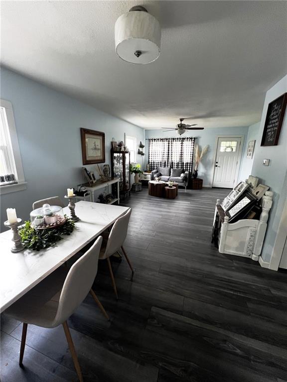 414 S 3rd St, Humboldt, KS 66748 - dining room featuring ceiling fan and wood finished floors