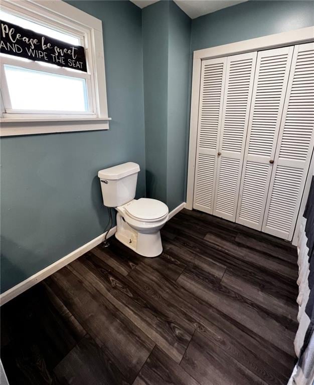 414 S 3rd St, Humboldt, KS 66748 - half bathroom featuring a closet and wood finished floors