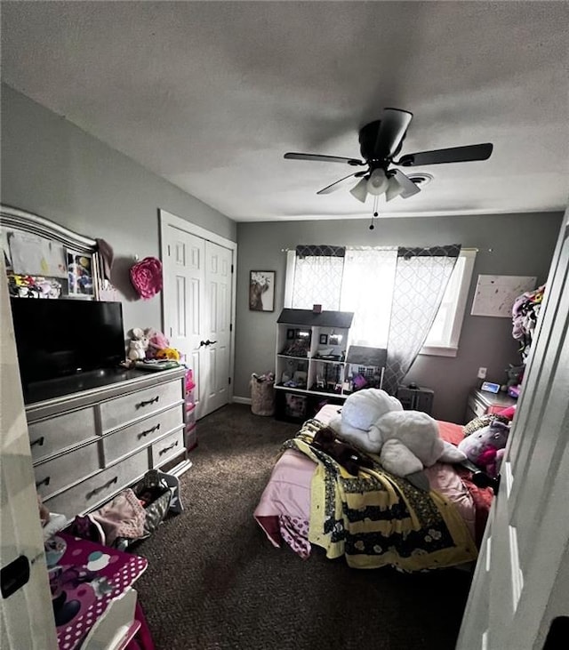 414 S 3rd St, Humboldt, KS 66748 - bedroom featuring carpet, a ceiling fan, a closet, and a textured ceiling