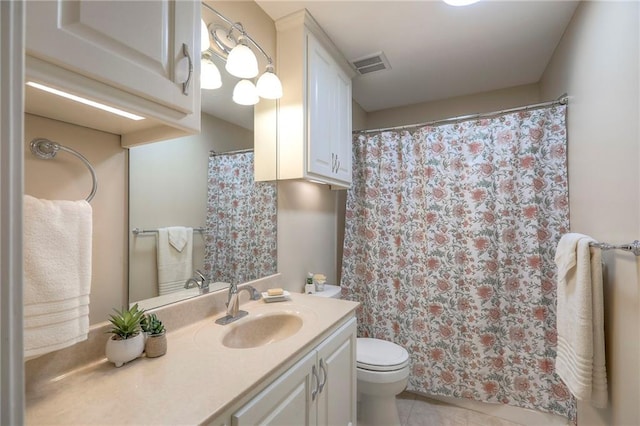 115 NE Green St, Lees Summit, MO 64063 - bathroom with vanity and tile patterned flooring