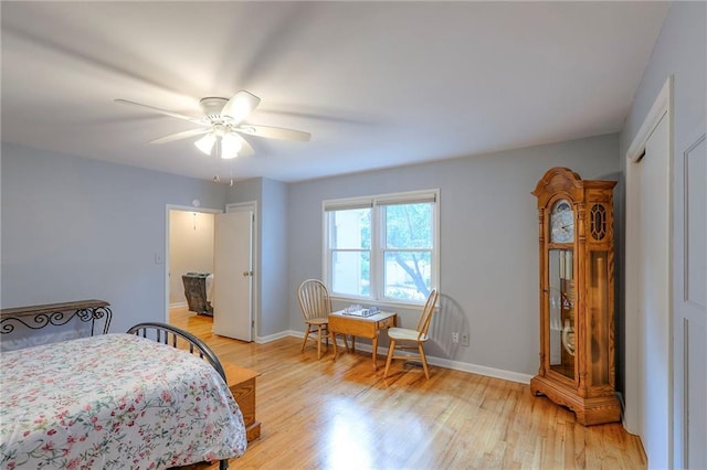 115 NE Green St, Lees Summit, MO 64063 - bedroom featuring light wood-style floors and ceiling fan