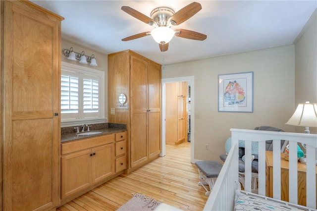 115 NE Green St, Lees Summit, MO 64063 - bedroom with light wood-type flooring and a ceiling fan