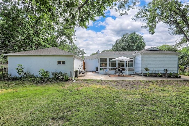 115 NE Green St, Lees Summit, MO 64063 - back of property featuring a patio and a yard