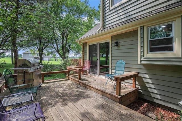 307 E Gore Rd, Raymore, MO 64083 - deck with a grill