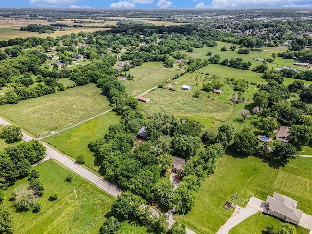 307 E Gore Rd, Raymore, MO 64083 - drone / aerial view of a tree filled landscape