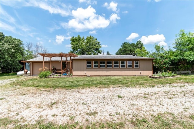 5470 SE Downing Rd, Lathrop, MO 64465 - rear view of house featuring a pergola and an attached garage