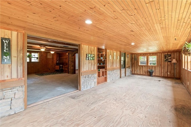 5470 SE Downing Rd, Lathrop, MO 64465 - spare room featuring wood walls, wood ceiling, and a ceiling fan