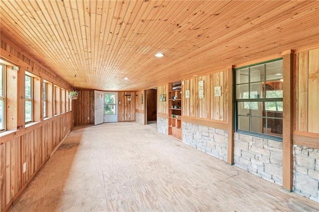5470 SE Downing Rd, Lathrop, MO 64465 - spare room featuring wooden walls and wood ceiling