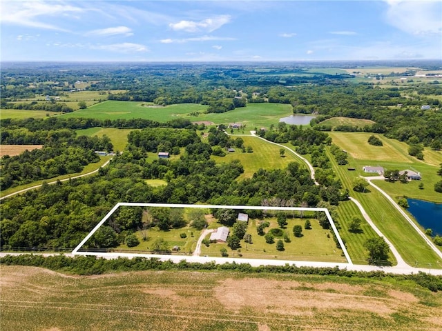 5470 SE Downing Rd, Lathrop, MO 64465 - view of rural area featuring property parcel outlined and a nearby body of water