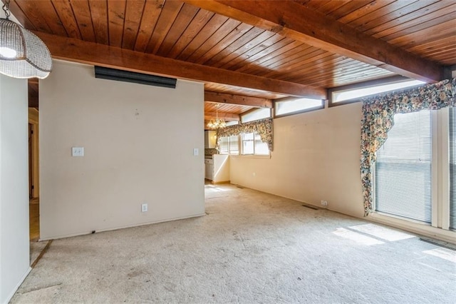 11120 E 35th Ter, Independence, MO 64052 - spare room with carpet floors, a chandelier, and a wood ceiling with exposed beams