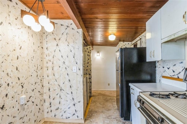 11120 E 35th Ter, Independence, MO 64052 - kitchen featuring wooden ceiling, white gas range oven, a chandelier, light countertops, and white cabinets