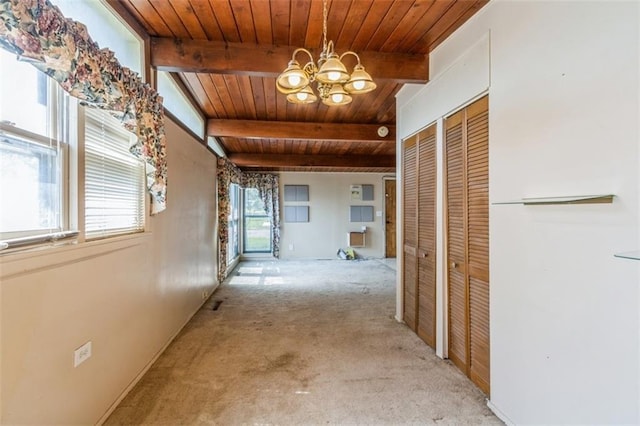 11120 E 35th Ter, Independence, MO 64052 - corridor with carpet floors, a wood ceiling with exposed beams, and a chandelier