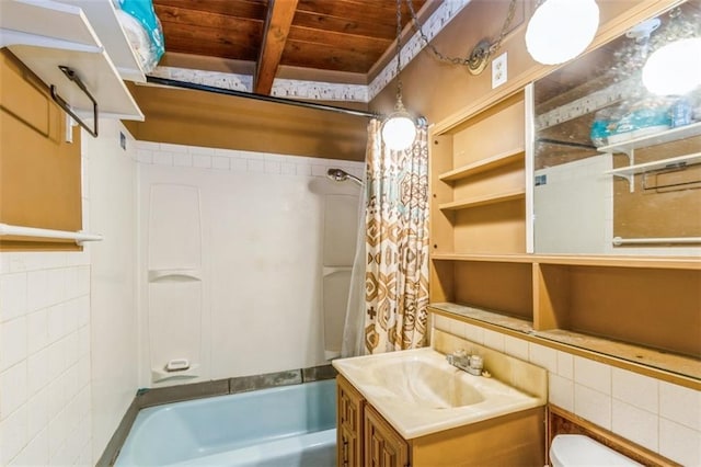 11120 E 35th Ter, Independence, MO 64052 - full bathroom featuring a wooden ceiling with exposed beams, shower / bath combination with curtain, vanity, and tile walls