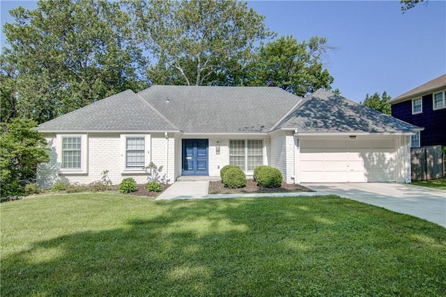 9920 Juniper Ln, Overland Park, KS 66207 - view of front of property with a garage, concrete driveway, a shingled roof, and brick siding