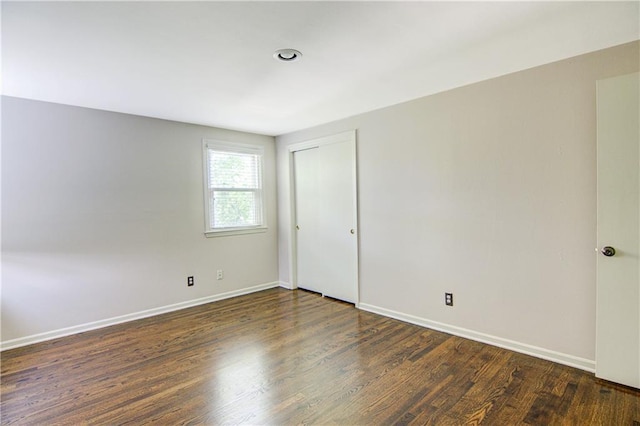 9920 Juniper Ln, Overland Park, KS 66207 - unfurnished room featuring baseboards and wood finished floors