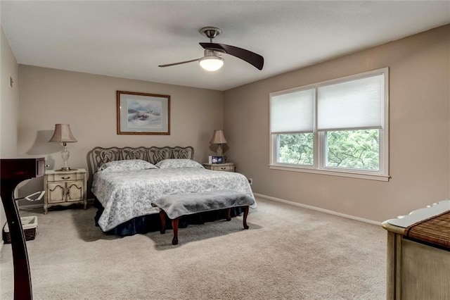 732 W 121st St, Kansas City, MO 64145 - carpeted bedroom with baseboards and a ceiling fan