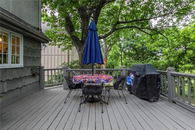 732 W 121st St, Kansas City, MO 64145 - deck with outdoor dining area and grilling area