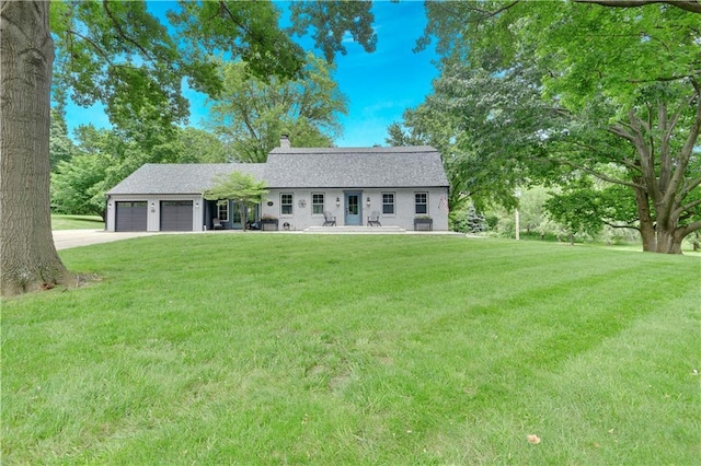 3200 NW 51st Ter, Blue Springs, MO 64015 - view of front of house with a chimney, a garage, driveway, a front yard, and roof with shingles