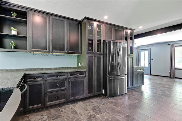 3200 NW 51st Ter, Blue Springs, MO 64015 - kitchen featuring freestanding refrigerator, recessed lighting, glass insert cabinets, open shelves, and range