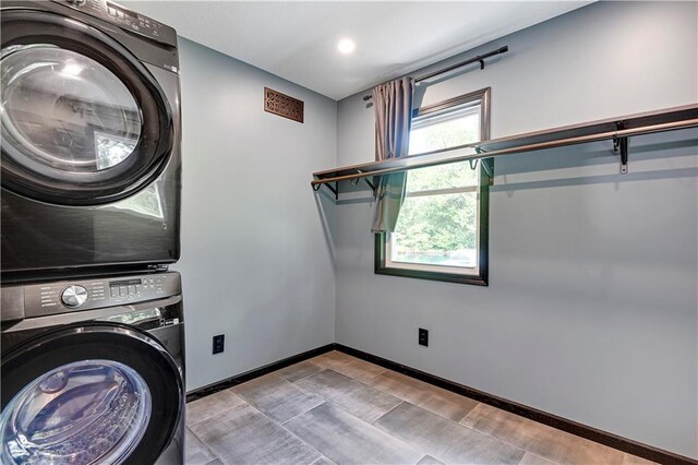 3200 NW 51st Ter, Blue Springs, MO 64015 - laundry area with stacked washing machine and dryer and recessed lighting