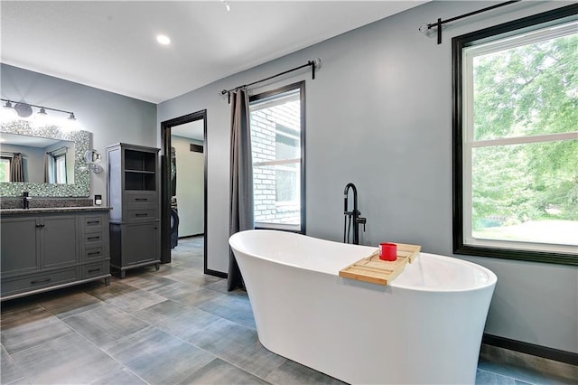 3200 NW 51st Ter, Blue Springs, MO 64015 - full bath with vanity and a soaking tub