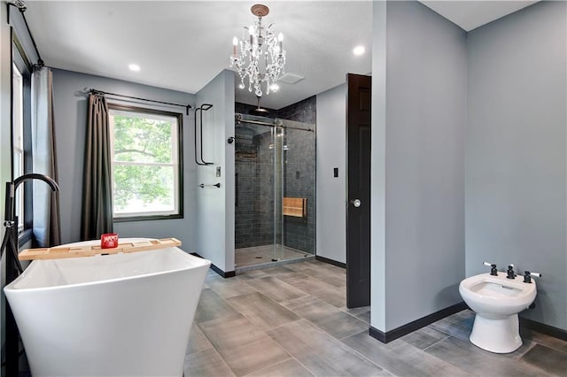 3200 NW 51st Ter, Blue Springs, MO 64015 - bathroom featuring a shower stall, a bidet, a freestanding tub, a chandelier, and recessed lighting