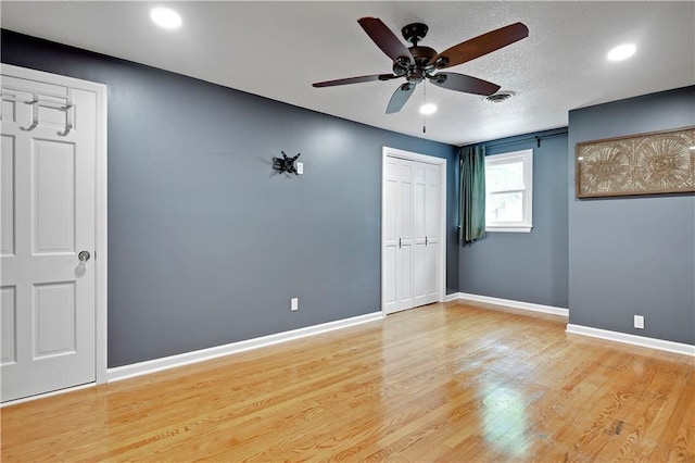 3200 NW 51st Ter, Blue Springs, MO 64015 - unfurnished bedroom featuring light wood finished floors, recessed lighting, and ceiling fan
