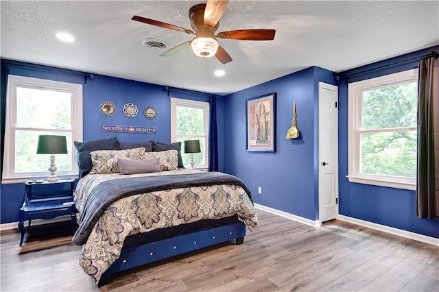 3200 NW 51st Ter, Blue Springs, MO 64015 - bedroom featuring wood finished floors and ceiling fan