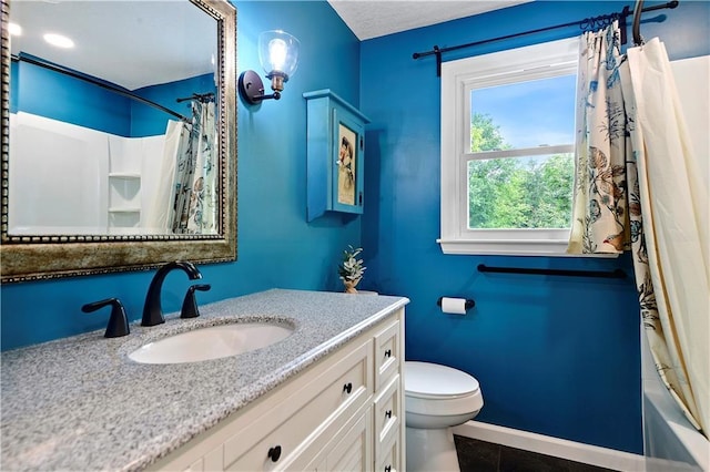3200 NW 51st Ter, Blue Springs, MO 64015 - bathroom featuring vanity, shower / bath combo, and tile patterned floors