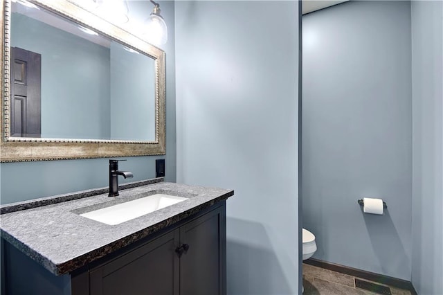 3200 NW 51st Ter, Blue Springs, MO 64015 - half bathroom featuring toilet and vanity