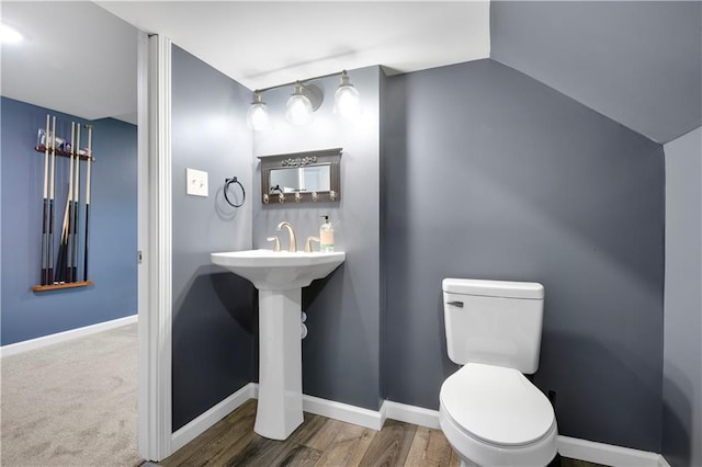 3200 NW 51st Ter, Blue Springs, MO 64015 - half bath featuring vaulted ceiling and wood finished floors