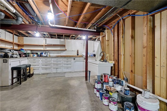 3200 NW 51st Ter, Blue Springs, MO 64015 - unfinished basement featuring a sink
