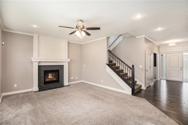 1532 SW Cross Creek Dr, Lees Summit, MO 64082 - unfurnished living room featuring a ceiling fan, stairway, carpet, ornamental molding, and a fireplace
