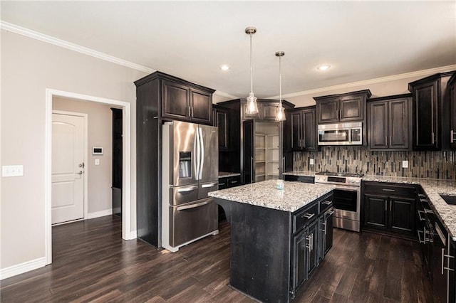 1532 SW Cross Creek Dr, Lees Summit, MO 64082 - kitchen featuring appliances with stainless steel finishes, tasteful backsplash, a center island, dark wood finished floors, and crown molding