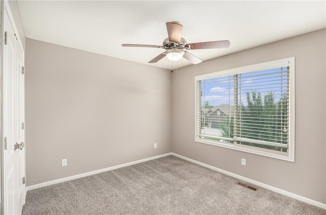 1532 SW Cross Creek Dr, Lees Summit, MO 64082 - carpeted spare room featuring baseboards and ceiling fan