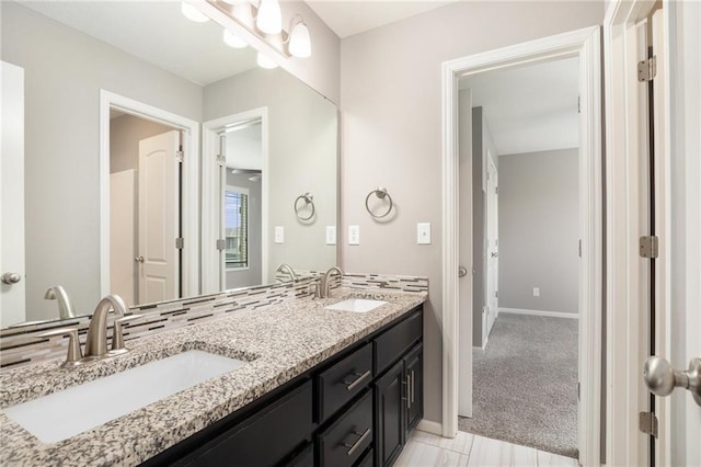 1532 SW Cross Creek Dr, Lees Summit, MO 64082 - full bath with double vanity and baseboards