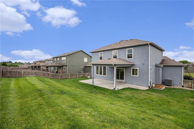 1532 SW Cross Creek Dr, Lees Summit, MO 64082 - rear view of property with a patio, a fenced backyard, and a shingled roof