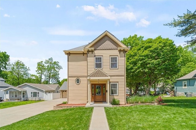 128 W Sea Ave, Independence, MO 64050 - victorian house with a front yard