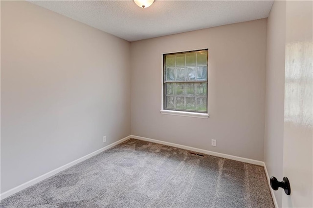 113 SE 250th Rd, Warrensburg, MO 64093 - spare room featuring carpet and a textured ceiling