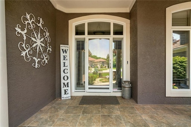 8709 Pine St, Lenexa, KS 66220 - doorway to property with stucco siding