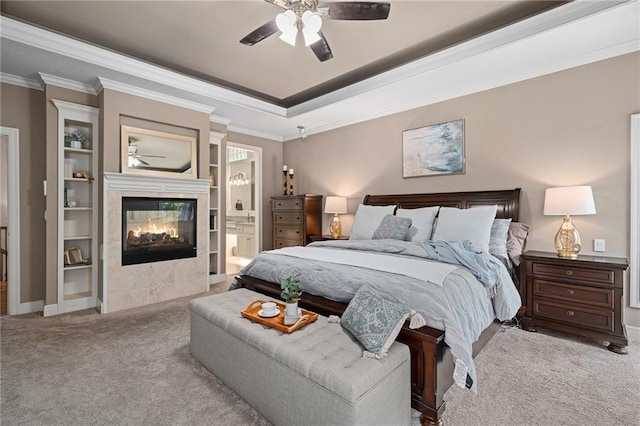 8709 Pine St, Lenexa, KS 66220 - bedroom with carpet floors, a multi sided fireplace, crown molding, a raised ceiling, and ceiling fan