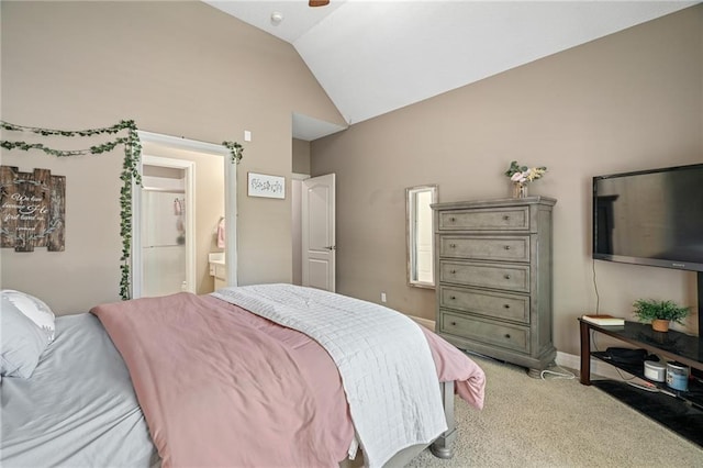8709 Pine St, Lenexa, KS 66220 - bedroom with lofted ceiling, light carpet, ensuite bath, and a ceiling fan