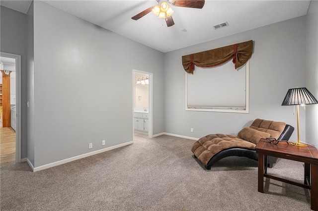 8709 Pine St, Lenexa, KS 66220 - living area with ceiling fan and carpet floors