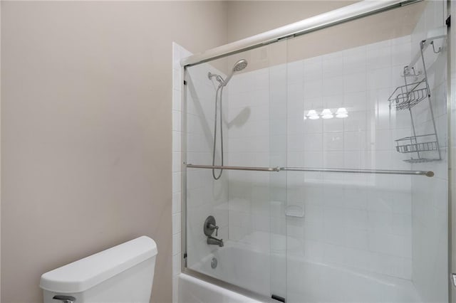 8709 Pine St, Lenexa, KS 66220 - full bath with enclosed tub / shower combo and toilet