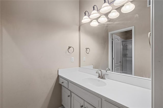 8709 Pine St, Lenexa, KS 66220 - bathroom featuring vanity, a chandelier, and an enclosed shower