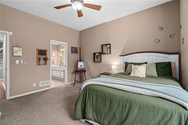 8709 Pine St, Lenexa, KS 66220 - bedroom with carpet, ensuite bath, and a ceiling fan